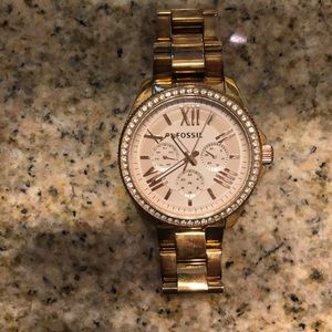 Fossil watch. Has some ware on back and on band.